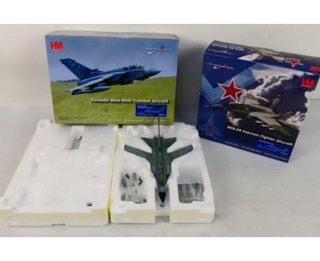 Hobby Master - Two boxed Hobby Master 1:72 scale diecast military aircraft models. Lot consists of HA6502 MiG-29A Fulcrum 412