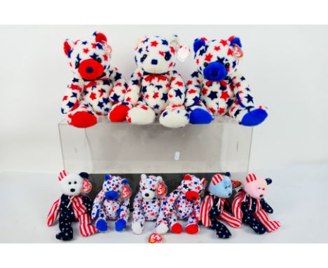 Ty Beanies - A sleuth of nine American themed Ty Beanies, housed within a perspex display case. Lot includes Ty Beannie Buddy