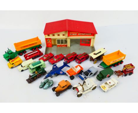 Matchbox - A Matchbox Fire Station # MG-1 and a group of vehicles including Lambretta TV175 # 36, Morris Cowley # 8, Ford Mil