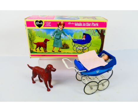 Pedigree - Sindy - A boxed Sindy 44510 'Walk in the Park', which contains, dog, pram, baby and accessories. Items appear Mint
