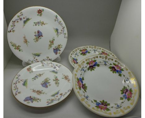 A pair of Royal Worcester plates and two early Derby plates, one with firing crack