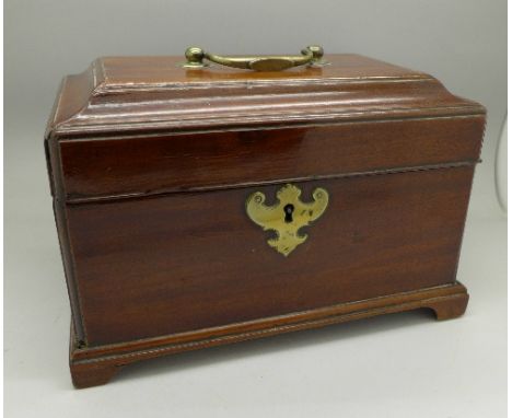 A 19th Century mahogany three compartment tea caddy, brass handle and escutcheon, with key