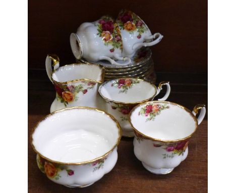Royal Albert Old Country Roses china, four cups, six saucers, sugar and cream and six side plates