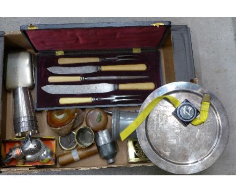 A cased carving set, a silver plated dish with scene of Westminster Abbey, a wrist compass, mineral specimen, wine pourers, e