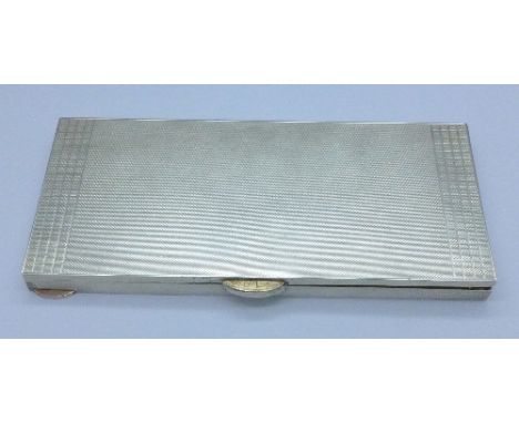 A silver Art Deco combination cigarette case/compact, London 1938, 396g, 18cm x 8cm