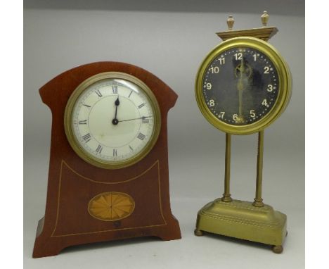 An inlaid mantel clock and a British made gravity clock
