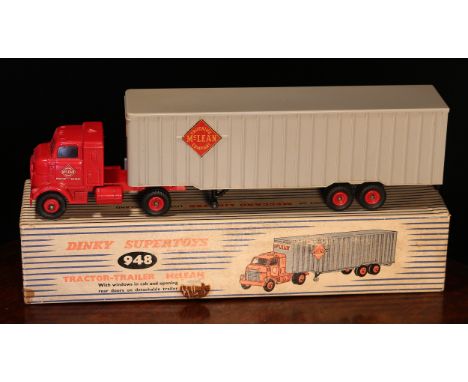 Dinky Supertoys 948 McLean tractor trailer, red cab with windows and decals to side doors, detachable grey plastic trailer wi