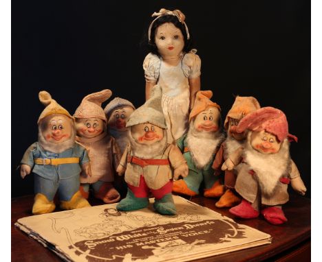 A 1930's set of Chad Valley Snow White and the Seven Dwarfs pressed felt novelty dolls, each with painted features and tradem