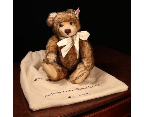 Steiff (Germany) EAN 660979 The English musical teddy bear, trademark 'Steiff' button to ear with red and white tag, 28cm hig