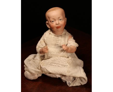 A Kämmer &amp; Reinhardt (Germany) bisque head and painted composition 'Kaiser Baby' character doll, the bisque head with sid