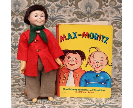 A reproduction bisque head and painted composition bodied novelty character doll/artist doll, as the German character Moritz 