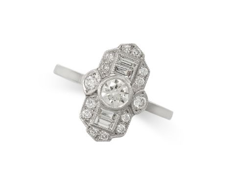 A DIAMOND DRESS RING in Art Deco design, set with a central diamond of 0.25 carats in a geometric border of round and baguett