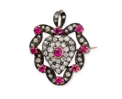 AN ANTIQUE RUBY AND DIAMOND SWEETHEART PENDANT / BROOCH in yellow gold and silver, designed as a heart within a ribbon, set w