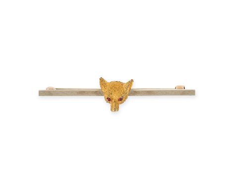 A RUBY HUNTING BAR BROOCH the bar applied with the head of a fox, with cabochon ruby eyes, no assay marks, 3.8cm, 3.1g.