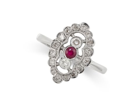 A RUBY AND DIAMOND RING in 18ct white gold, the navette shaped face set with a round cut ruby in a border of round cut diamon