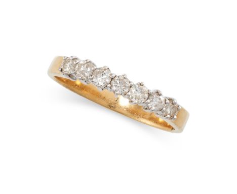 A DIAMOND SEVEN STONE RING in 18ct yellow gold, set with round cut diamonds, totalling 0.50 carats, British hallmarks for 18c