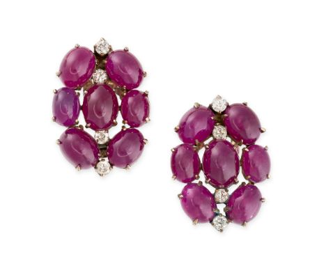 A PAIR OF VINTAGE RUBY AND DIAMOND CLIP EARRINGS each set with a cluster of cabochon rubies, accented by round cut diamonds, 