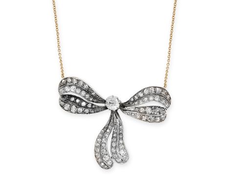 AN ANTIQUE DIAMOND BOW PENDANT NECKLACE designed as a ribbon tied in a bow, set with old and rose cut diamonds, on later chai