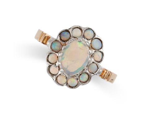 AN OPAL CLUSTER DRESS RING in yellow gold and white gold, set with a cluster of cabochon opals, no assay marks, size P / 7.5,