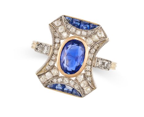 A SAPPHIRE AND DIAMOND DRESS RING in 18ct yellow gold, set with an oval cut sapphire of 1.24 carats in a border of old cut di