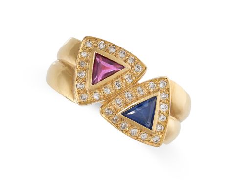 A RUBY, SAPPHIRE AND DIAMOND DRESS RING in yellow gold, set with a triangular cut ruby and blue sapphire, within borders of r