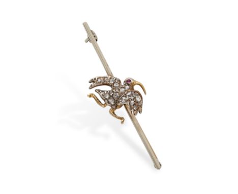 AN ANTIQUE DIAMOND AND RUBY BIRD BROOCH in 9ct yellow gold, designed as a curlew, set with rose cut diamonds and a cabochon r