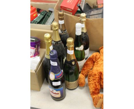 Seven bottles of sparkling wine