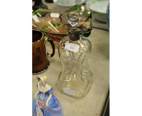 Silver topped decanter