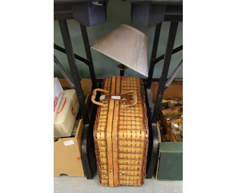 Wicker picnic hamper and lamp
