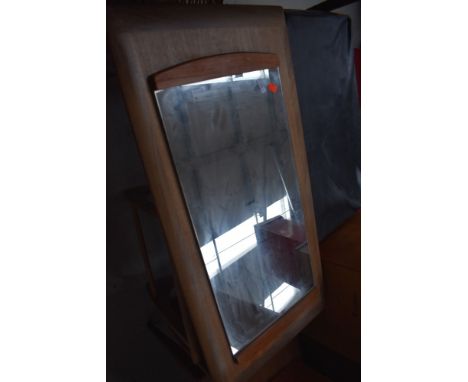 A vintage teak ended dual orientation wall mirror, approx. 79 x 36cm