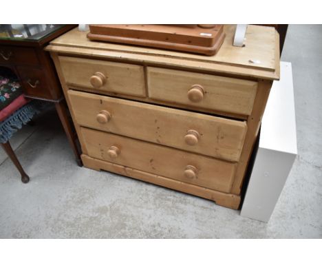 A stripped pine chest of two over two drawers, dimensions approx. W90 D45 H75cm