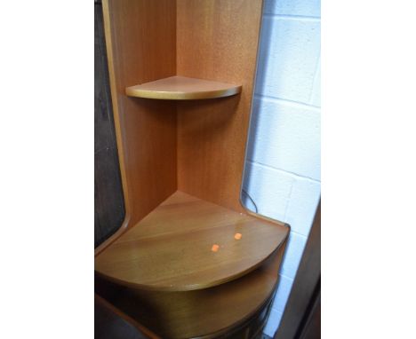 A vintage Nathan corner shelf with cupboard under