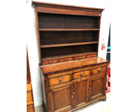 An 19th Century part oak and cross banded dresser , plate racking having three drawers to base, over triple frieze drawer and