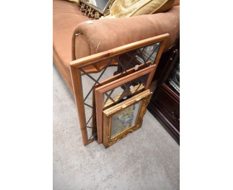A selection of decorative mirrors and print