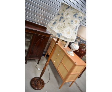 A traditional wooden standard lamp