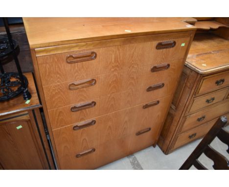 A 1970s style teak bedroom chest of five graduated drawers, labelled inside drawer William Lawrence?, similar to G plan, widt
