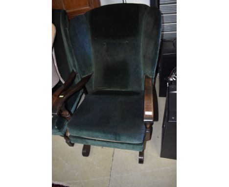 A vintage wood frame and green dralon wing back chair and similar rocker