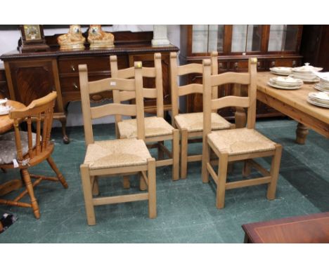 Four rush seated light timber kitchen chairs, height to seat pad 45 cm, width 50 cm, depth 45 cm, maximum height 100 cm