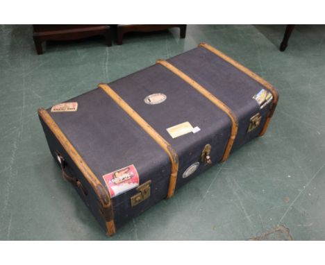 Blue trunk with reproduction travel labels