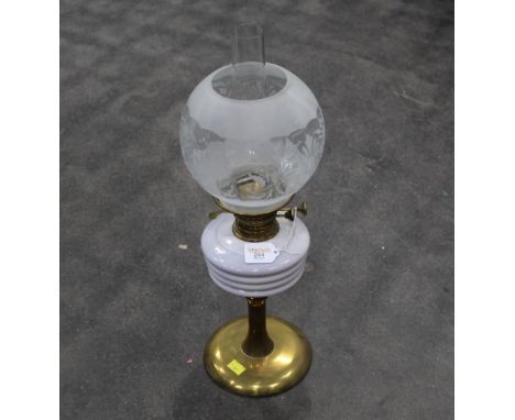 Vintage oil lamp with glass reservoir and brass base 