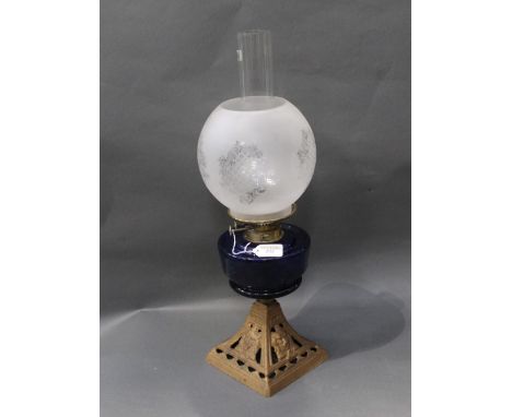 Oil lamp with blue glass reservoir 