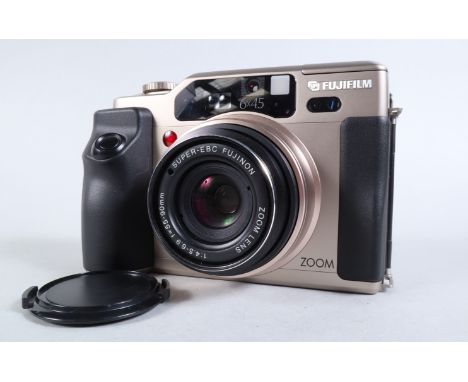 A Fujifilm GA645Zi Professional Camera, serial no 5060032, powers up, lens extends, not film tested, body G, light wear, with