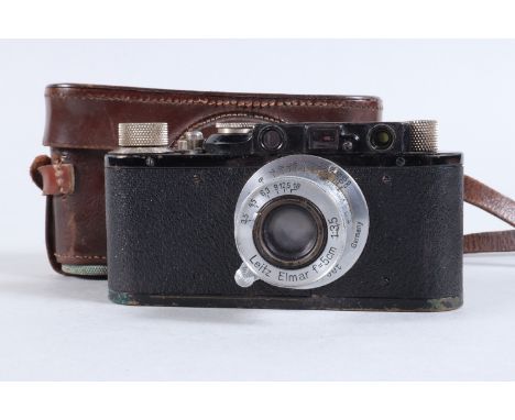 A Black Leitz Wetzlar Leica II Camera, serial no 86832, 1932, first year of production, body F, paint loss and age-related we