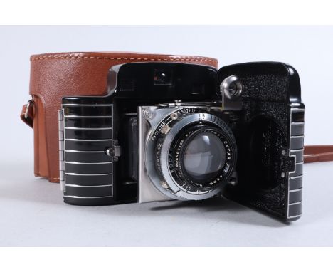 A Kodak Bantam Special Rangefinder Camera, shutter working, viewfinder clear, rangefinder working. Body G, light scratch to t