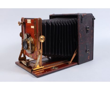 A Sanderson De Luxe Hand and Stand Camera, 6½ x 4¾in, made by Houghtons Ltd, serial no 20035, circa 1911, chamfered tapered b