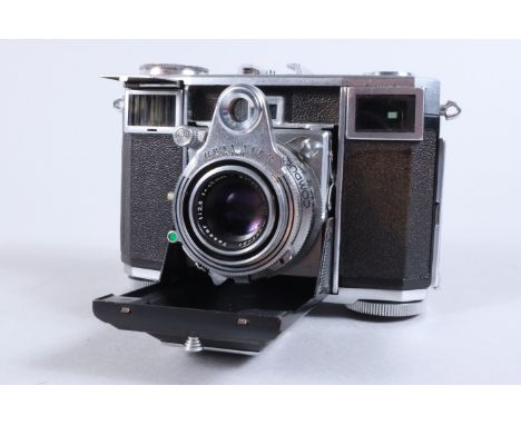 A Contessa 35 Folding Camera, second version, 1953-55, serial no Y44970, film run through, shutter working, meter not respons