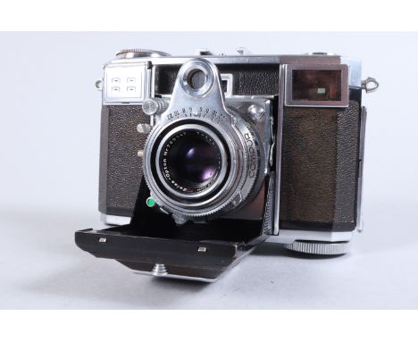 A Contessa 35 Folding Camera, second version, 1953-55, serial no W 92807, film run through, shutter working, meter not respon