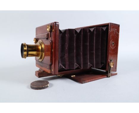 A Rouch's Patent Portable Plate Camera, circa 1885, 6½ x 4¾in, square-cornered tapered bellows, an Instantaneous Doublet lens
