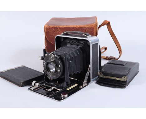 A Kern Aarau Bigou Camera, serial no on shutter  675569, 1925, 3¼ x 4, aluminium body, rounded corners, leather inlay, body G