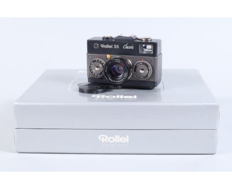 A Rollei 35 Classic Compact Camera, black version 63275, serial no 7106714, shutter working, meter responsive, with HFT 40mm 